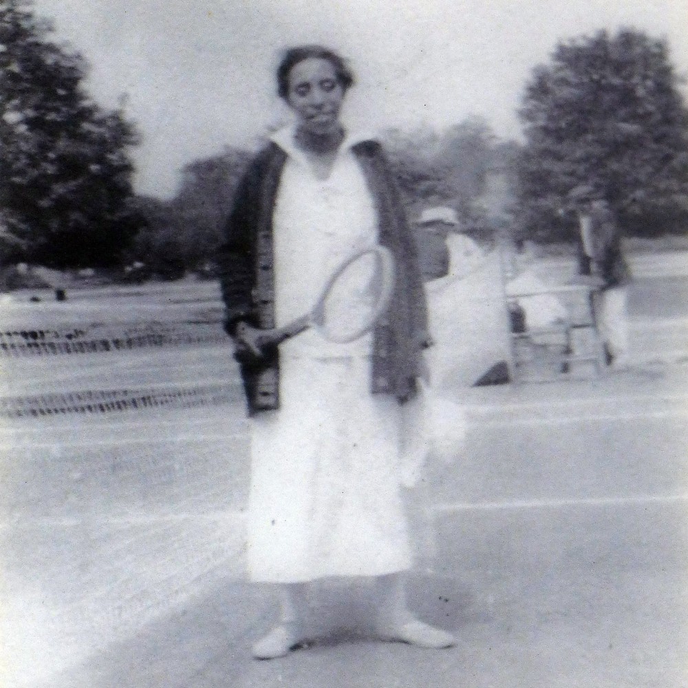 Lucy Diggs Slowe with tennis racquet