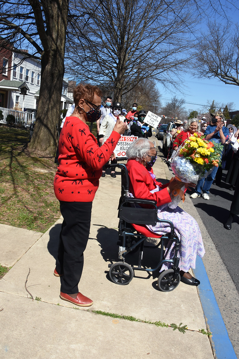 During the parade the crowd y stopped along Union Avenue to sing happy birthday to resident Mabel Hart, who was turning 102.