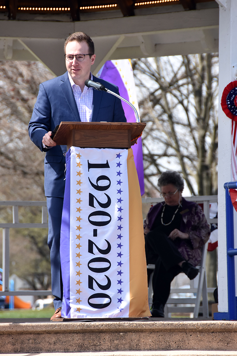 Steve Bodnar, at podium, banner says 1920- 2020