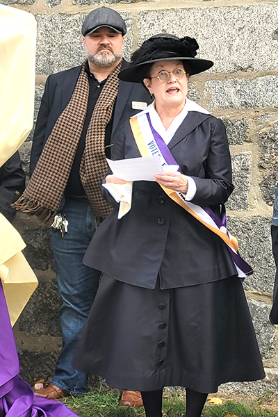 Vicki Embrey portraying Laura L. Byrne. Then executive director of the Howard Historical Society Shawn Gladden in rear.