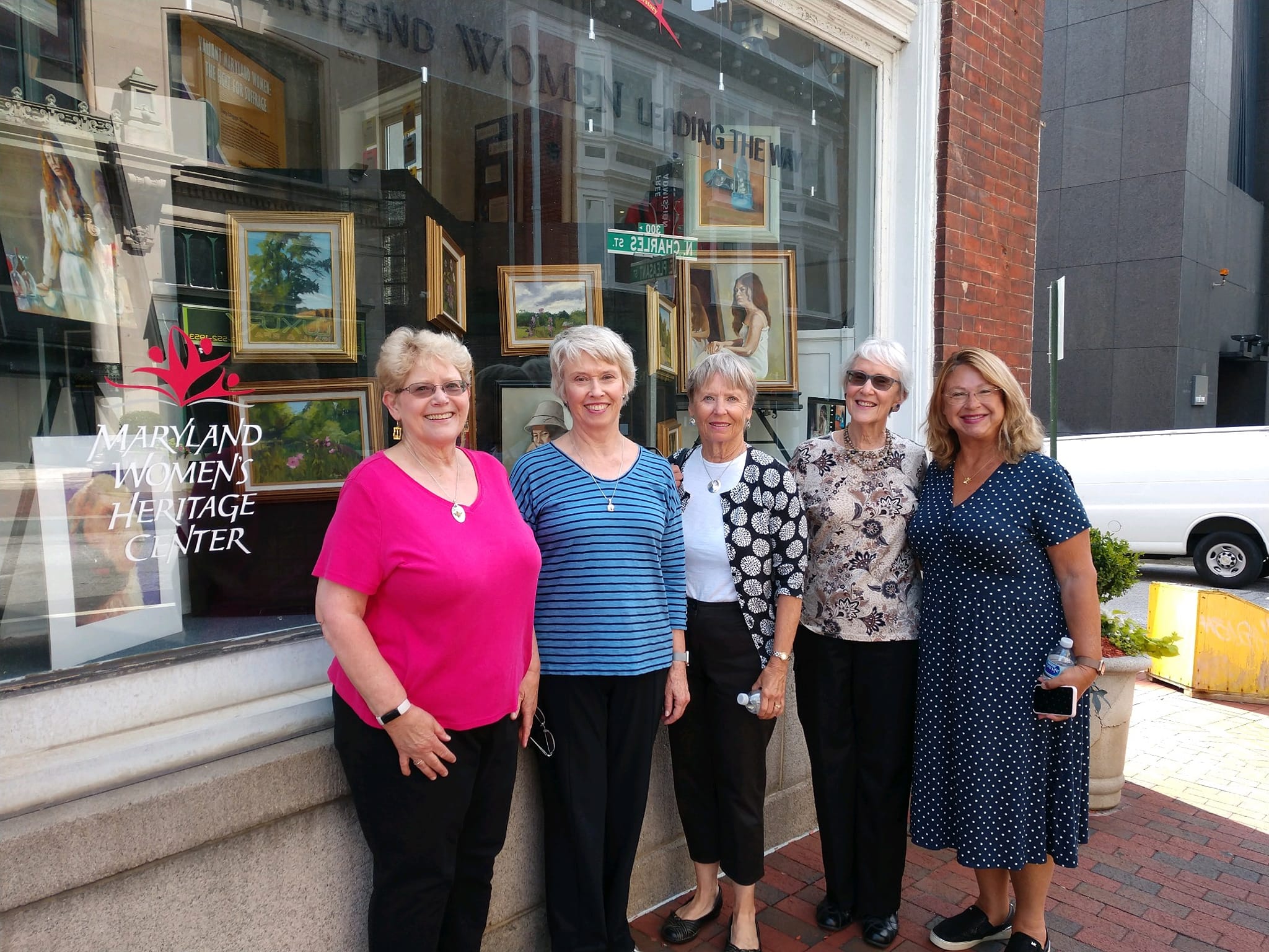 Five women standing in front of 333 N.Charles Street