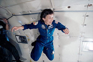 Mary Cleave floating in midair during her STS-61B mission training on board the KC-135 reduced gravity aircraft in 1985. (NASA)