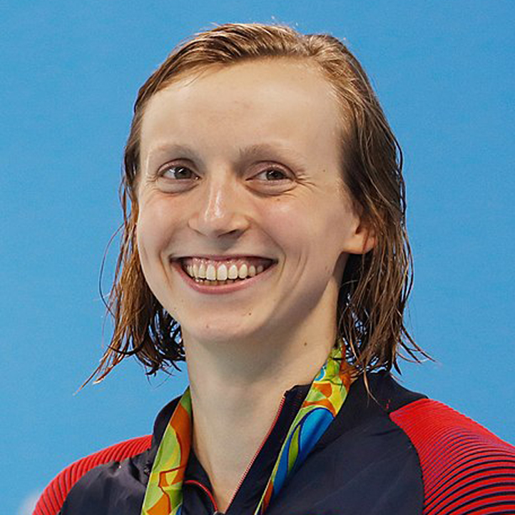 Katie Ledecky in 2016 olympic portrait smiling and with wet hair