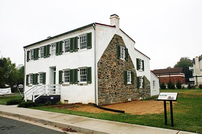 Keeper Havre de grace White brick keepers house in havre de grace, with outline of a previous adjacent house on its side