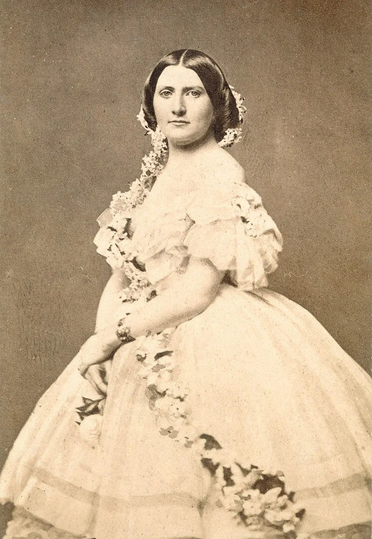 formal portrait of Harriet Lane Johnston in a white dress with large petticoat