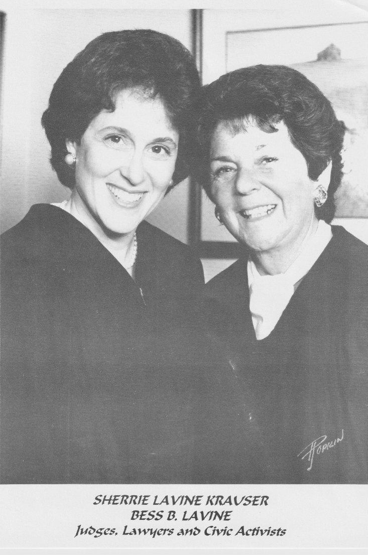 A B & W photo of Judge Bess B. Lavine and her daughter Sherrie Lavine Krauser. They are wearing judge's robes and heads are tilted to each other